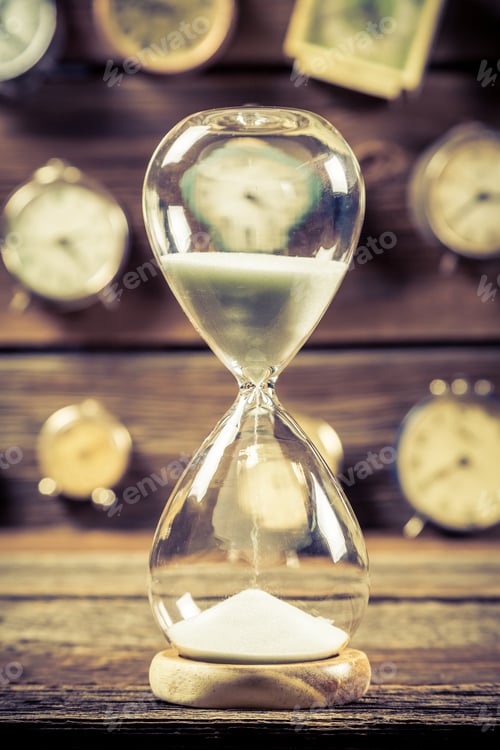 Preview: Closeup of vintage hourglass as the old way of timing
