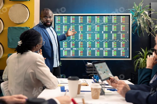 Preview: Team leader hosting a meeting in conference room talking sense into his staff