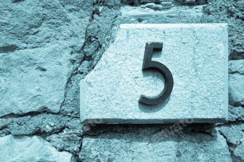 Preview: The Figure Five Is Placed By A Closeup On A Stone Wall For The Indication Of House Number