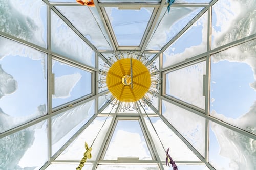 Preview: view of the pillar-shaped roof in the shape of a pyramid in the snow. symmetry, geometric shapes