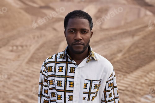 Preview: African American Man with Traditional Ornaments in Desert