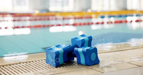 Preview: Fitness, indoor sport or dumbbell at swimming pool for safety, learning or aqua aerobics. Blue equi