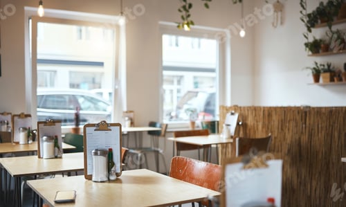 Preview: Table, chair and menu in an empty coffee shop in the city ready for service on opening day. Furnitu