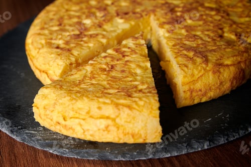 Preview: Closeup of a fresh tasty Spanish omelette, a traditional dish from Spain