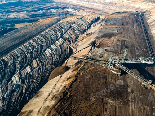 Preview: Mining equipment in a brown coal open pit mine near Garzweiler, Germany. Aerial View