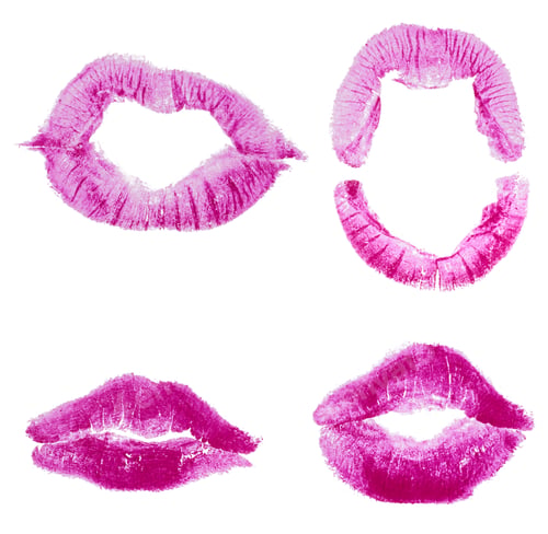 Preview: Imprints of human lips painted with pink lipstick on a white background