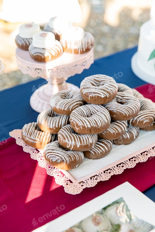 Delicious Chocolate Donuts on Elegant Dessert Tablescape