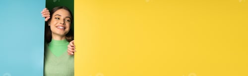 Preview: Teen girl in cozy jumper posing near colorful background, banner