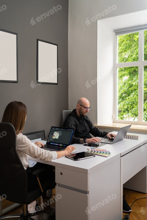 Preview: Two colleagues discussing new information about products