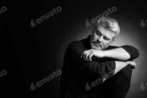 Preview: Portrait of handsome man on dark background, space for text. Black and white effect