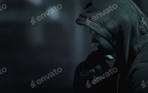 Preview: Suspicious Men in Black Hoodie