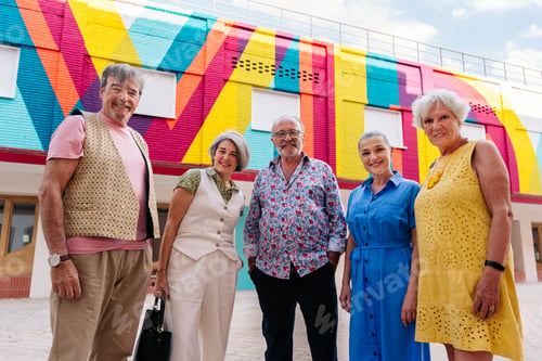 Preview: Group of senior friends meeting outddors in the city and having fun