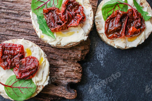 Preview: Sun-Dried Tomatoes, Sandwich Appetizer Snack (Bruschetta) Menu Concept. Background. Top View. Copy
