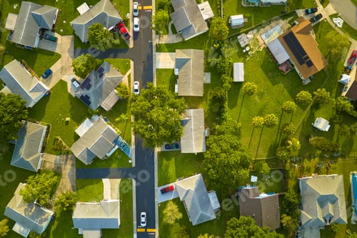 Preview: Aerial view of small town America suburban landscape with private homes
