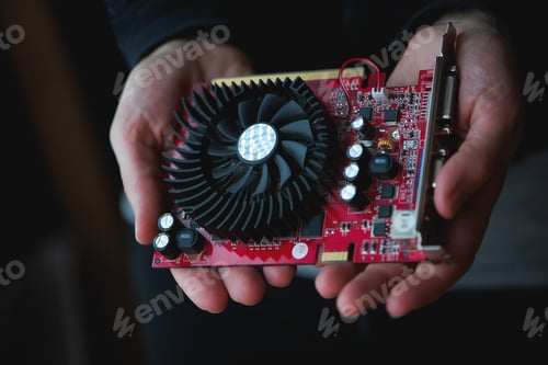 Preview: Graphics Card Held In Human Hands