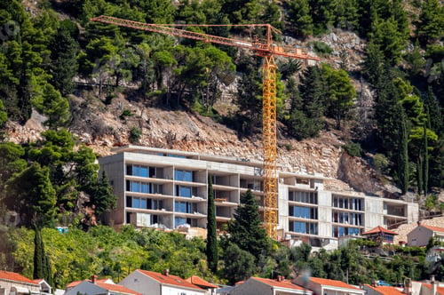 Preview: Construction of new buildings on hillside in Dubrovnik, Croatia during sunny day