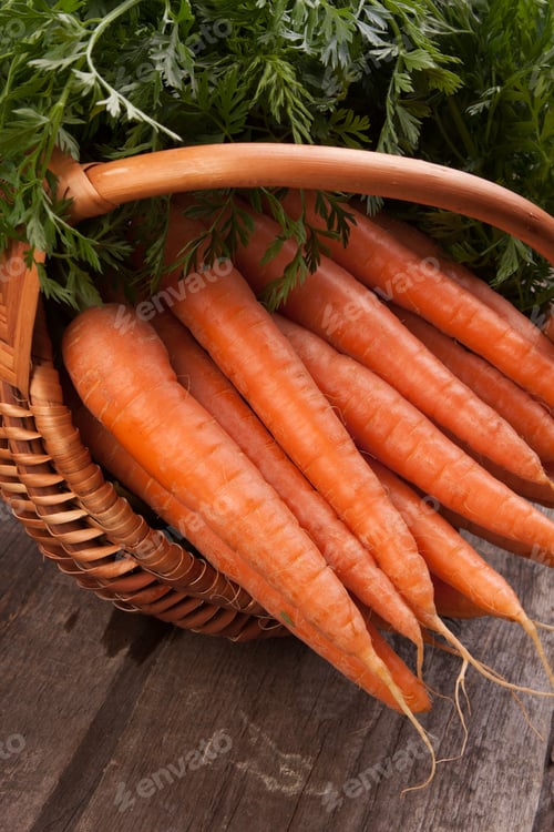 Preview: Fresh Carrots in Basket on Rustic Wood Table