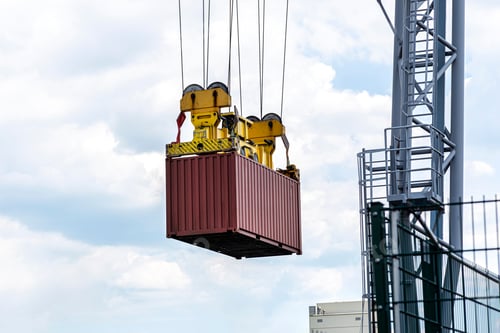 Preview: A container gantry crane on a rail loads the container into a barge