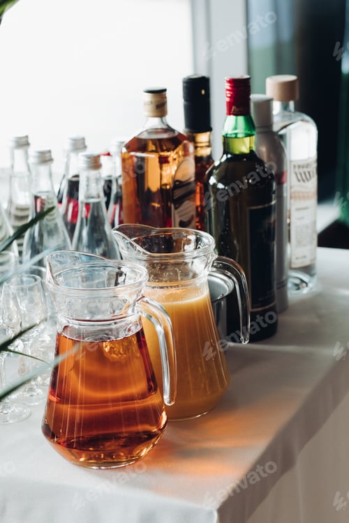 Preview: View from side of beverages served on table during party