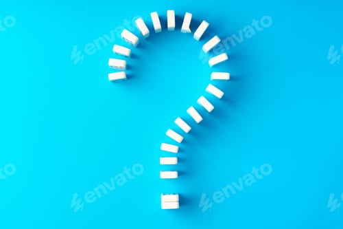 Preview: Domino tiles set in question sign shape on blue background