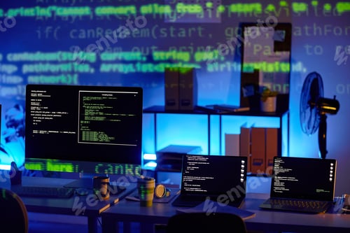 Preview: Row of laptops and computer monitor with decoded data on their screens