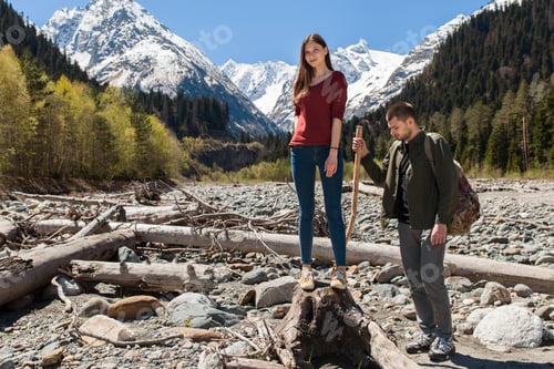 Preview: young hipster couple in love on winter vacation in mountains