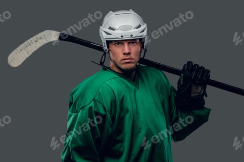 Preview: Hockey player holds gaming stick.