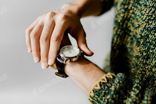 Preview: Closeup of a black watch on a wrist