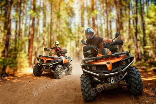Preview: Two atv riders, speed race in forest, front view