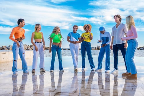 Preview: Multi-ethnic group of friends starting to dance outdoors