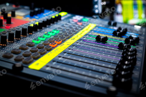 Preview: Sliders and buttons on Audio Mixing Desk at live event