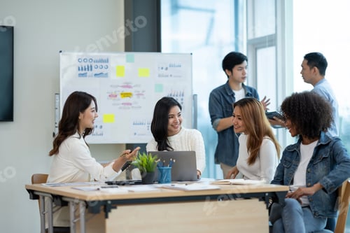 Preview: Group of Asian business people meeting to discuss and plan investment business and market analysis