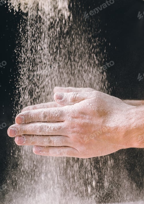 Preview: adult man hands work with flour, dark photo