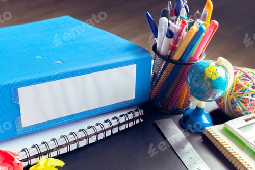 Preview: Desk of an artist with lots of stationery objects