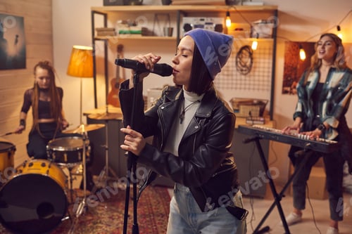 Preview: Young female singer and her band recording new songs