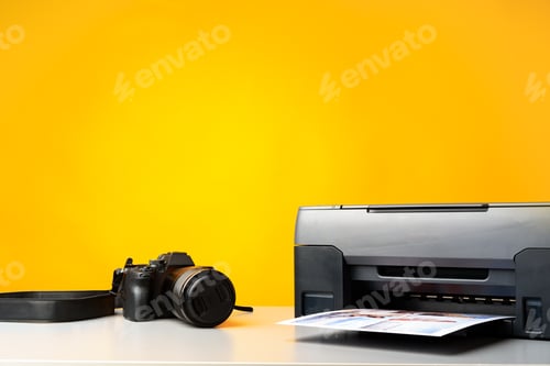 Preview: Printer and photo camera on table. Printing photos concept