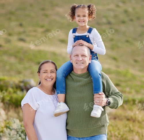 Preview: Shot of a mature couple spending time outdoors with their granddaughter
