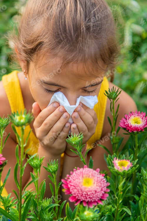 Preview: The child is seasonal allergy to flowers. Selective focus.