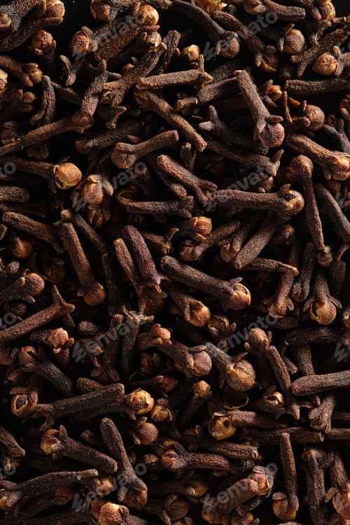 Preview: Food background of clove seeds closeup. Spices. Flat lay.