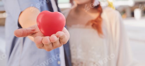 Preview: A couple show heart on hand, valentine theme