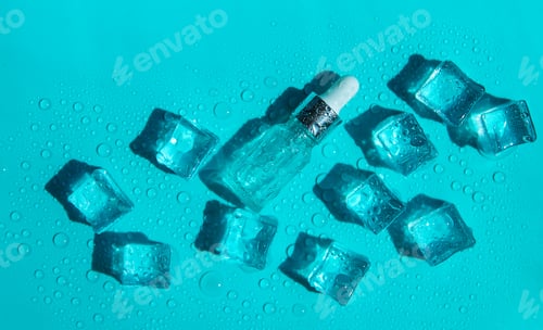 Preview: Ice cubes on a blue background. Selective focus.
