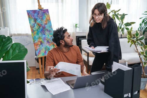 Preview: Business colleagues do their work discussing and planning a project
