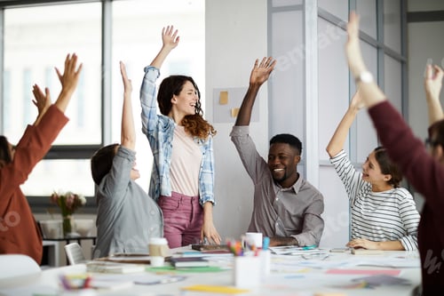 Preview: Contemporary Business People Raising Hands