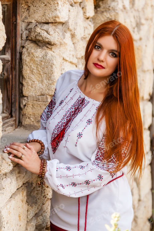 Preview: beautiful girl in Ukrainian embroidered and red skirt