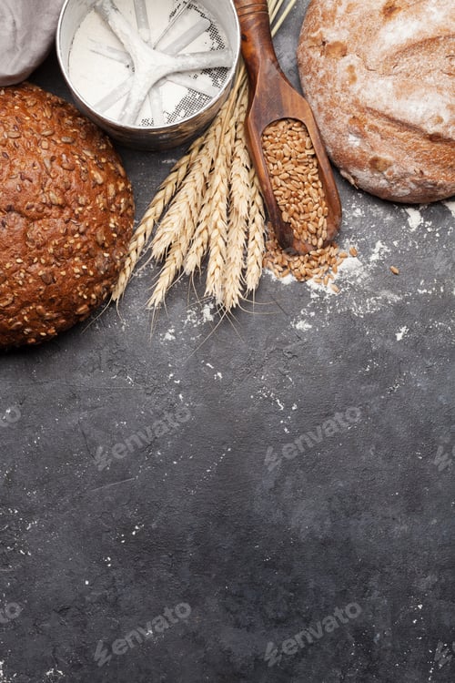 Preview: Various bread with wheat, flour and cooking utensils