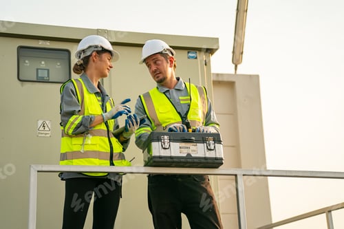 Preview: photovoltaic panel, Engineer with energy measurement tool photovoltaic modules for energy