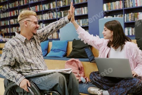Preview: Celebrating Success by Student in Wheelchair and Friend