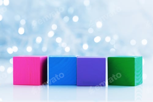 Preview: blocks, creative greeting card on bokeh background