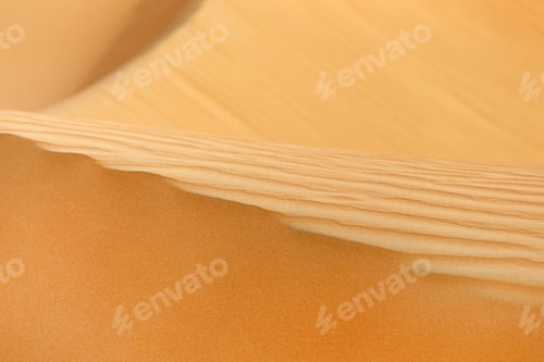 Preview: Desert sand texture, abstract closeup pattern. Sand dunes in Abu Dhabi, UAE.