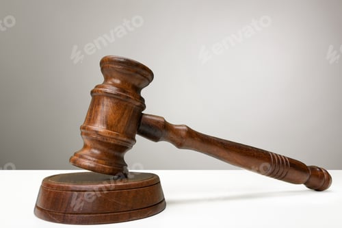 Preview: Judge's gavel on light background, front view. Law concept
